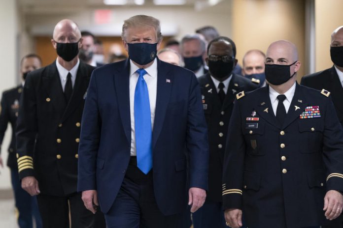 President Donald Trump arrives at Walter Reed to visit with wounded military members